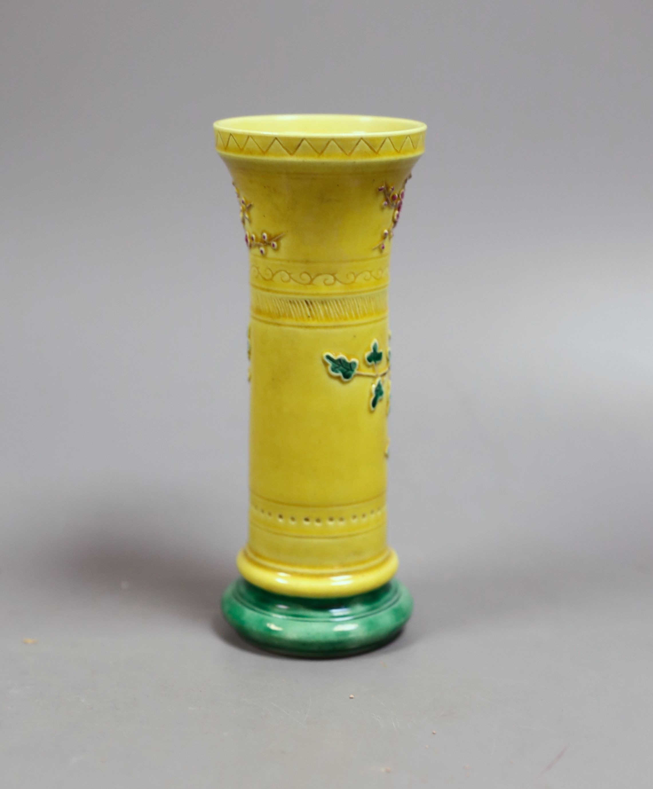 A 19th century Chinese (Qing) yellow background vase, 15 cms high.